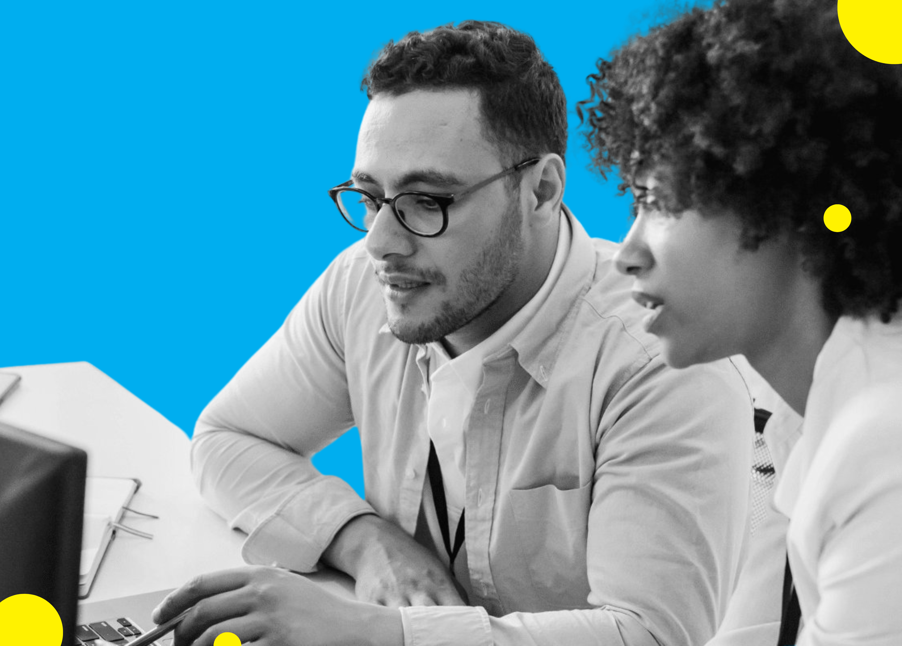 Two individuals collaborate at a desk with laptops in front of them, surrounded by vibrant blue and yellow background elements.